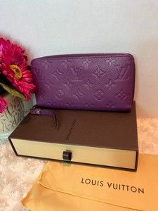 Louis Vuitton Monogram Empreinte Leather Zip Wallet Fushcia